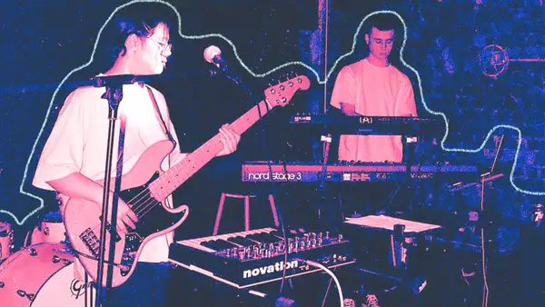 members of the band perform in a nightclub