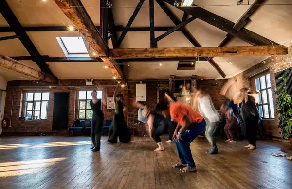 Blurry photo of people dancing