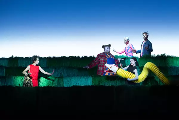 A scene from the stage adaptation of Jungle Book featuring 5 performers in costume