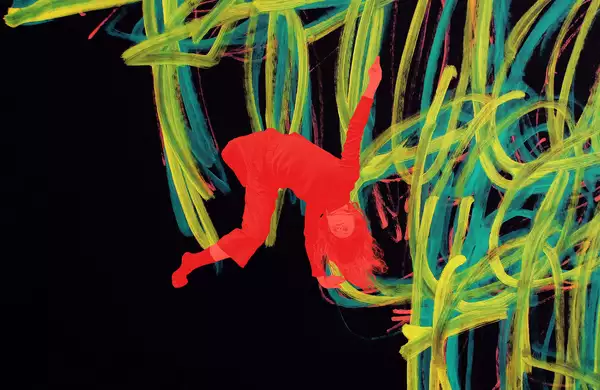 A painting by Michael Beard showing yellow, red and blue lines on a black background. There is a red image of a dancer upside down overlayed on the painting.