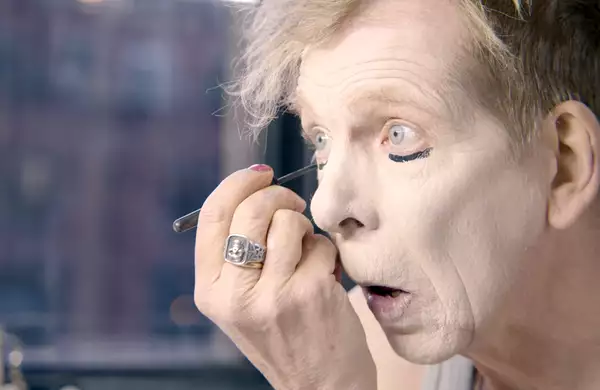 The artist David Hoyle applying makeup