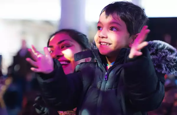A young child enjoys an activity at Aviva Studios